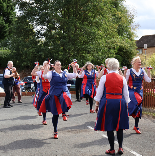 Butterflies, knees lifted and sticks held high