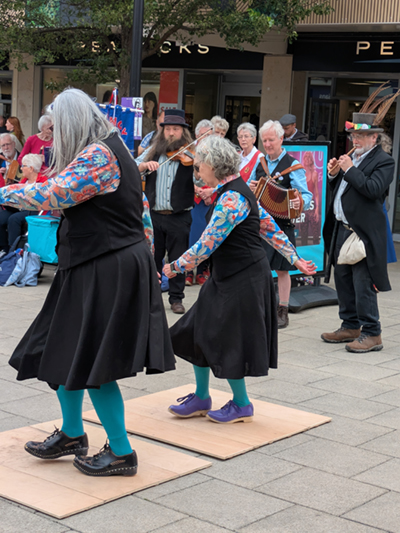 Castle Clog dancers dancing on their wooden boards