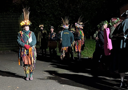 our hosts reparing to dance outside