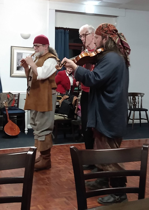 3 members of different bands playing together