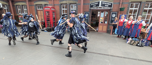 Moonlight Morris in their blue and black tatters, in full flow
