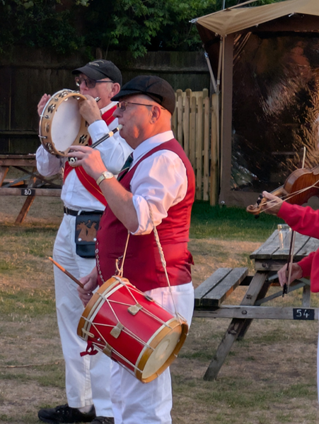 Musiciians from White Hart Morris Men playing Pipe and Tabor, Harmonica and Tambourine